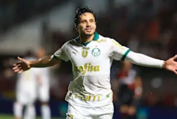 Em 18 segundos, Palmeiras assume liderança do Brasileirão: de Veiga em Goiânia a Alerrandro no Rio" Resumo (251 palavras): A 34ª rodada do Campeonato Brasileiro foi marcada por dois gols em apenas 18 segundos, que mudaram a tabela da competição e colocaram o Palmeiras na liderança. Aos 19 minutos do primeiro tempo, Raphael Veiga abriu o placar para o Verdão contra o Atlético-GO, em Goiânia, com um gol dentro da área. Apenas instantes depois, Alerrandro, do Vitória, balançou as redes no Nilton Santos, contra o Botafogo. O gol de Veiga, ocorrido às 19h49min46s, colocou o Palmeiras na liderança do campeonato, mas foi o gol de Alerrandro, aos 19h50min04s, que consolidou a posição do time paulista. Nesse momento, o Palmeiras se tornou líder isolado, com 70 pontos e 21 vitórias, enquanto o Botafogo caiu para a segunda posição, com 70 pontos e 20 vitórias. Embora o Botafogo tenha empatado com o Vitória por 1 a 1, perdeu a liderança às vésperas de uma final antecipada contra o Verdão. O Palmeiras, que ainda tem duas partidas importantes pela frente, pode se consagrar tricampeão da Série A se vencer os próximos jogos. Restam apenas três rodadas para o fim do Brasileirão, e a disputa está acirrada para definir o campeão. Resumo (20 palavras): Dois gols em 18 segundos colocaram o Palmeiras na liderança isolada do Campeonato Brasileiro, faltando três rodadas para o fim. Tags: Campeonato Brasileiro, Palmeiras, liderança, vitória, Veiga, Alerrandro, Botafogo, Vitória, Atlético-GO, futebol, Série A, 34ª rodada, gols, título, final antecipada, Brasil, campeonato, futebol brasileiro, futebol nacional, campeonato nacional.